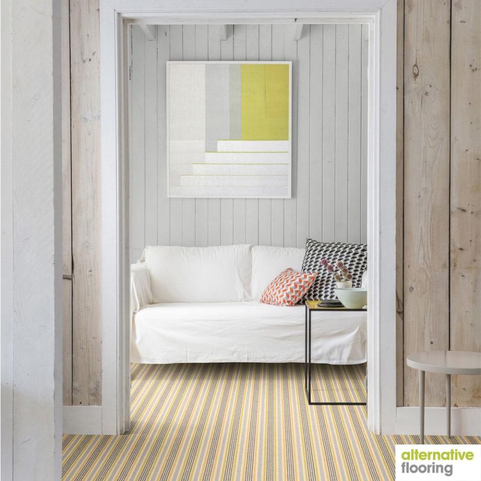 <p>This pinstriped carpet would be at home in a beach house, paired as it is here with whitewashed wall cladding, and a light and airy colour palette. If you have hints of yellow in your patterned carpet, grab your colour wheel to make sure your surroundings will complement - neutrals, a burnt orange, or cooler tones such as a blue or green are safe choices. </p><p>Pictured: <a href="https://www.johnlewis.com/alternative-flooring-margo-selby-loop-carpet/sun-seasalter/p4183174" rel="nofollow noopener" target="_blank" data-ylk="slk:Alternative Flooring Margo Selby Loop Carpet at John Lewis;elm:context_link;itc:0;sec:content-canvas" class="link ">Alternative Flooring Margo Selby Loop Carpet at John Lewis</a></p>