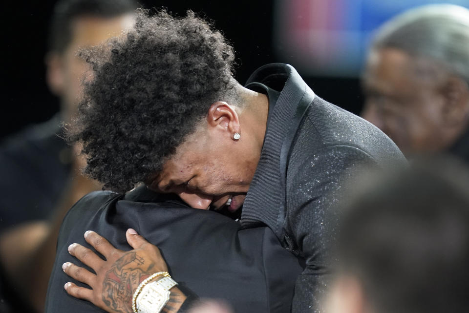 MarJon Beauchamp reacts after being selected 24th overall by the Milwaukee Bucks in the NBA basketball draft, Thursday, June 23, 2022, in New York. (AP Photo/John Minchillo)