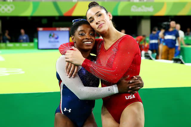 <p>Alex Livesey/Getty Images</p> Simone Biles and Aly Raisman