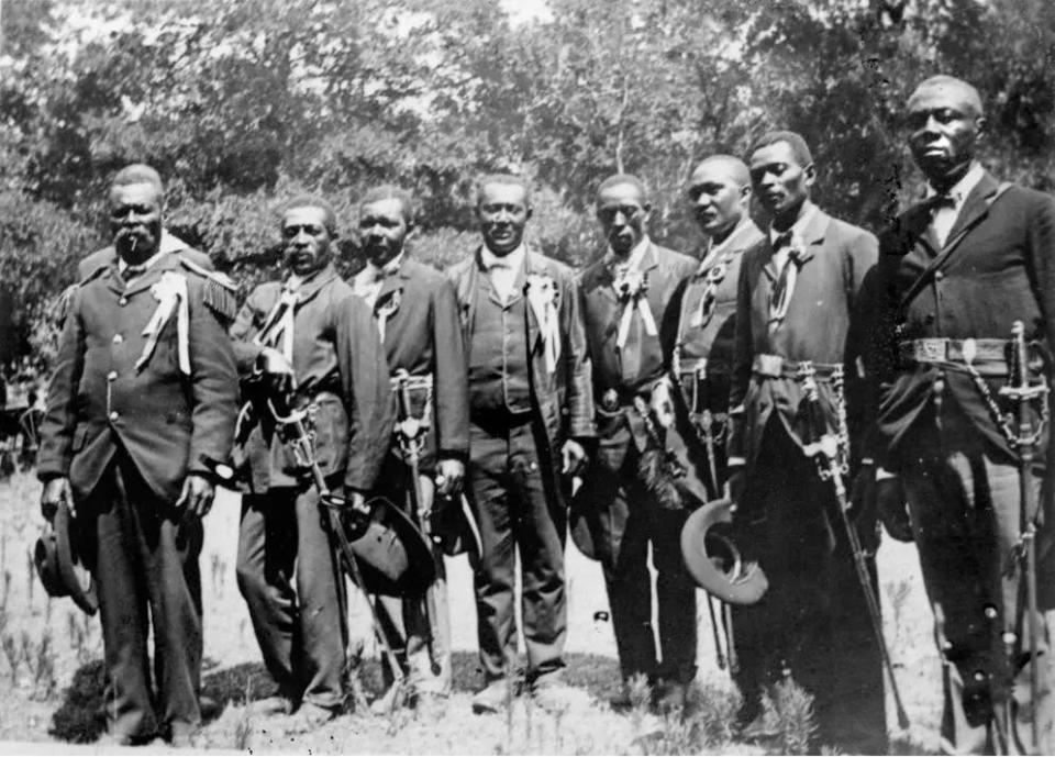 Group of men in Civil War uniforms, likely for a re-enactment of the Union’s entry into Galveston.