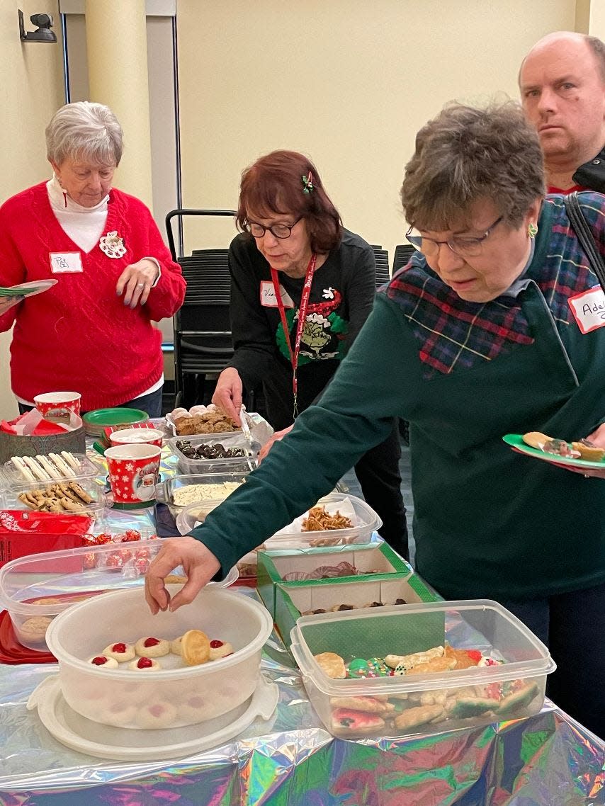 The December book club meeting also was the annual Christmas celebration. Members brought cookies to share with each other and the Ellis staff in appreciation for use of the meeting space.