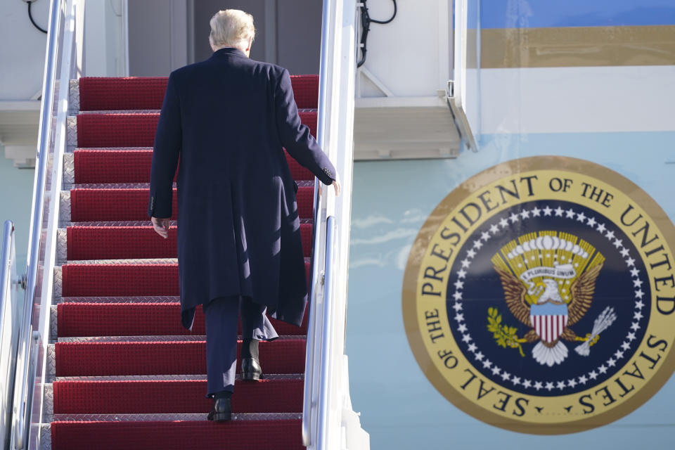 President Donald Trump boards Air Force One at Andrews Air Force Base, Md., for a trip to Alamo, Texas, Tuesday, Jan. 12, 2021. (AP Photo/Manuel Balce Ceneta)