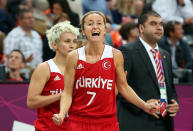 LONDON, ENGLAND - JULY 30: Nilay Kartaltepe #7 of Turkey celebrates on the bench in the final moments of the Women's Preliminary Round match against Czech Republic on Day 3 at Basketball Arena on July 30, 2012 in London, England. (Photo by Christian Petersen/Getty Images)