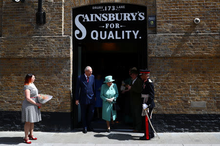 Britain's Queen Elizabeth visits a replica of one of the original Sainsbury's stores in London, Britain May 22, 2019. REUTERS/Hannah Mckay