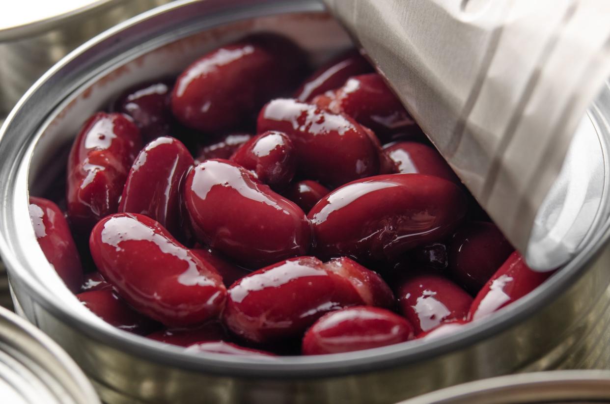 Canned red kidney beans in just opened tin can. Non-perishable food