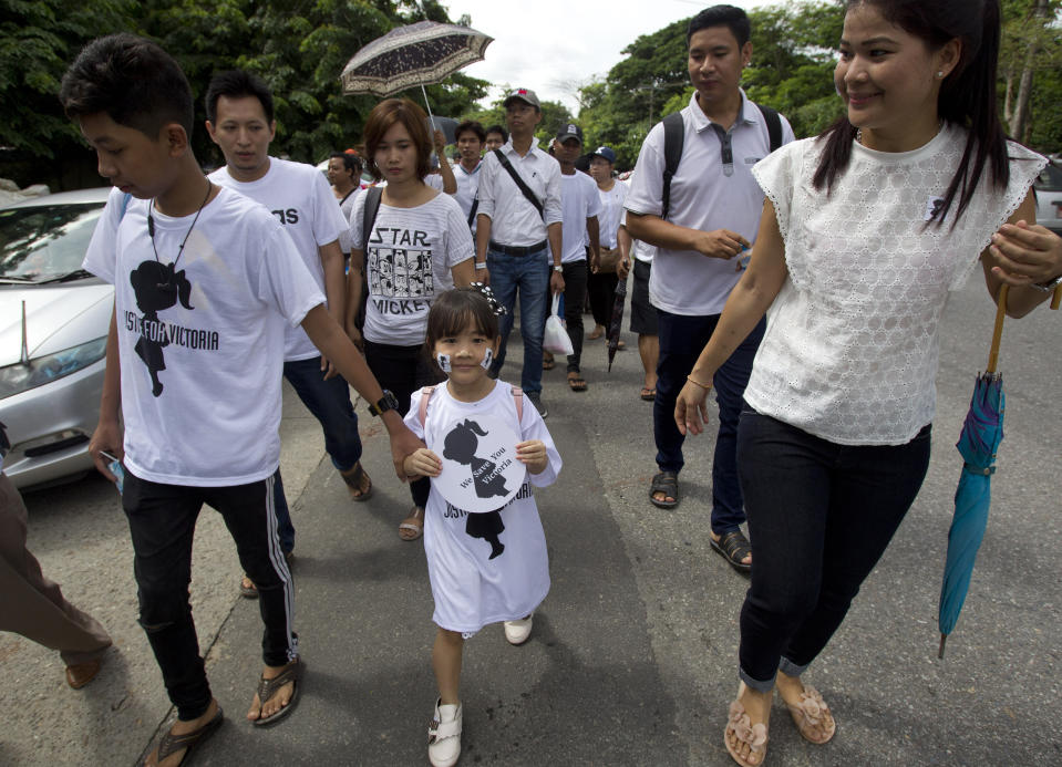 People march during a protest in Yangon, Myanmar Saturday, July 6, 2019. Hundreds of people marched to Myanmar’s Central Investigation Department on Saturday in Yangon to demand justice for a 2-year-old girl who was allegedly raped in the country’s capital in May. (AP Photo/Thein Zaw)