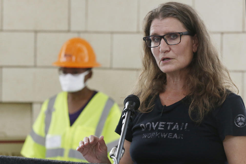 FILE - In this Friday, July 17, 2020 file photo, Kary Stackelbeck, state archaeologist, speaks during a news conference as work continues on an excavation of a potential unmarked mass grave from the 1921 Tulsa Race Massacre, at Oaklawn Cemetery, in Tulsa, Okla. “If the boundaries we estimate are accurate, what we excavated in October is maybe a third or a quarter of that overall size,” she says. “It is not unreasonable for us to develop an estimate of around 30 total (bodies) in the overall mass grave, and that’s a conservative estimate.” (AP Photo/Sue Ogrocki, File)