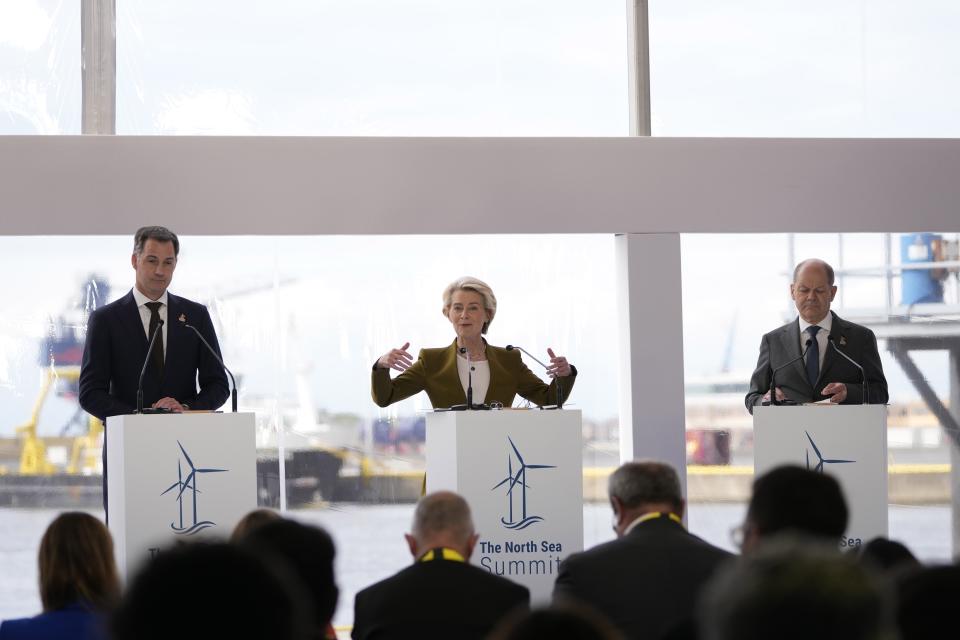 FILE - Belgium's Prime Minister Alexander De Croo, from left, European Commission President Ursula von der Leyen and Germany's Chancellor Olaf Scholz participate in a media conference at the North Sea Summit in Ostend, Belgium, April 24, 2023. Nine Western European leaders gathered with the hopes of ramping up the production of clean energy from wind turbines in the North Sea to both meet climate targets and reduce their strategic energy dependence on Russia. (AP Photo/Virginia Mayo, File)