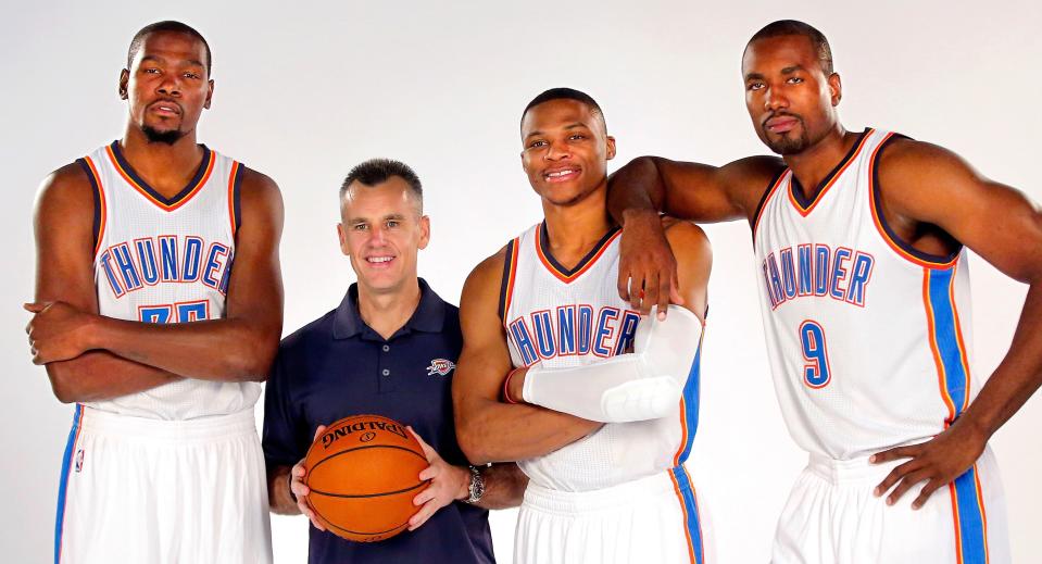 New Thunder coach, Billy Donovan, poses with players, Kevin Durant, Russell Westbrook and Serge Ibaka during media day interviews and photo sessions for the 2015-2016 Oklahoma City Thunder basketball team inside Chesapeake Arena on Monday, Sep. 28, 2015. Photo by Jim Beckel, The Oklahoman.