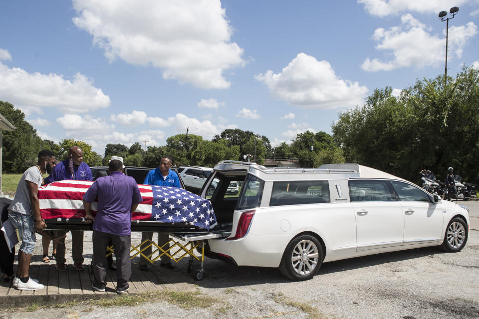 FILE - The body of New Orleans Police detective Everett Briscoe is placed into a hearse before it is escorted from the Respect for Life Funeral Home for the journey back to New Orleans, Tuesday, Aug. 24, 2021, in Houston. Frederick Jackson has pleaded guilty in the fatal shooting of off-duty officer Briscoe and his friend during a holdup at a Houston restaurant in 2021, prosecutors announced Wednesday, May 15, 2024. (Brett Coomer/Houston Chronicle via AP)