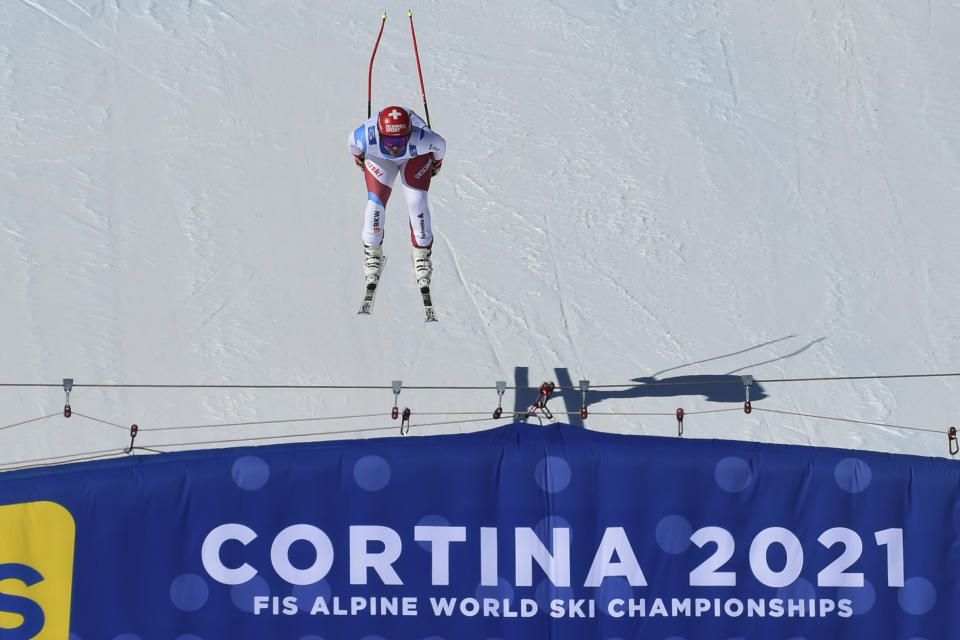 Switzerland's Beat Feuz competes during the men's downhill, at the alpine ski World Championships in Cortina d'Ampezzo, Italy, Sunday, Feb.14, 2021. (AP Photo/Marco Tacca)