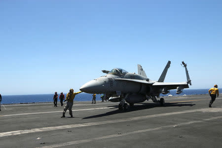 F/A-18 fighter jet takes off at the USS Harry S. Truman aircraft carrier in the eastern Mediterranean Sea, June 6, 2016. REUTERS/Andrea Shalal