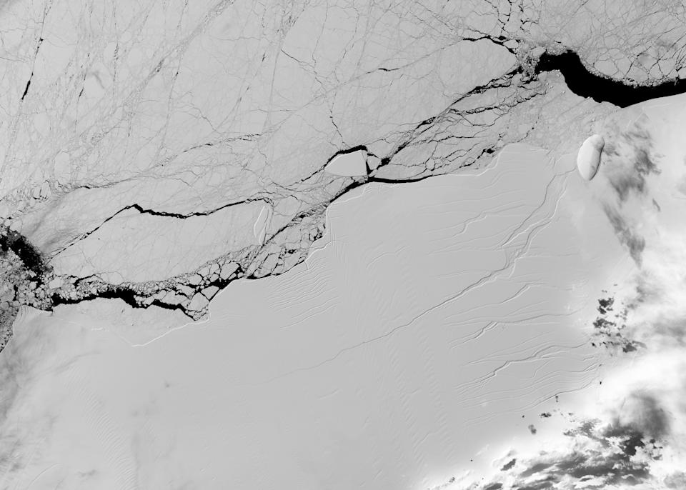 <p>Satellite image of a long crack in the Larsen C ice shelf, taken on March 8, 2017, by the Operational Land Imager on the NASA/USGS Landsat 8 spacecraft. An iceberg about the size of the state of Delaware split off from Antarctic’s Larsen C ice shelf sometime between July 10 and July 12. (Photo: NASA/USGS Landsat) </p>