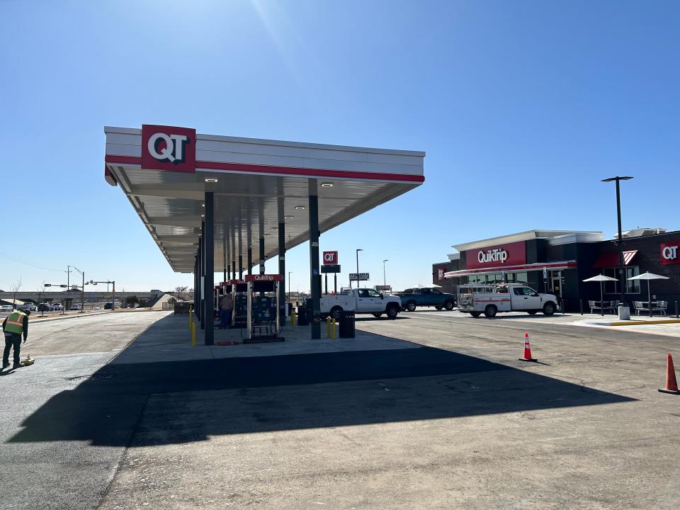 Workers are putting fishing touches on the QuikTrip travel center on Bell & I-27.