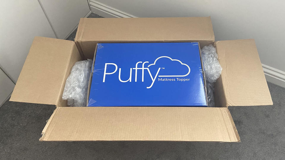 Puffy Deluxe Mattress Topper in its box