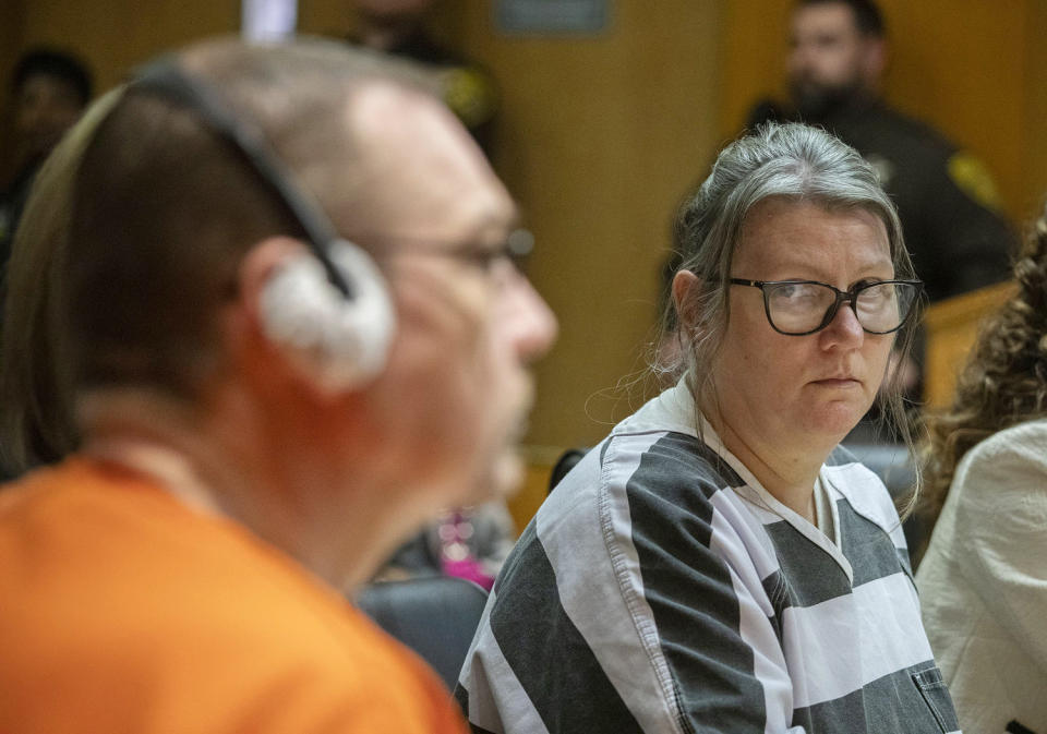 Jennifer Crumbley looks at her husband, James Crumbley, during their sentencing on April 9, 2024 at Oakland County Circuit Court in Pontiac, Mich. (Bill Pugliano / Getty Images)