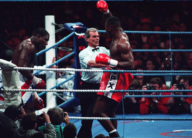 Lennox Lewis, right, overcame Frank Bruno 29 years ago (David Jones/PA)