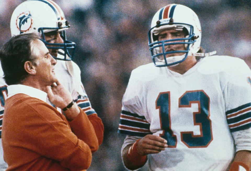 Miami Dolphins quarterback Dan Marino confers with coach Don Shula on the sidelines during Super Bowl XIX. (AP Photo)