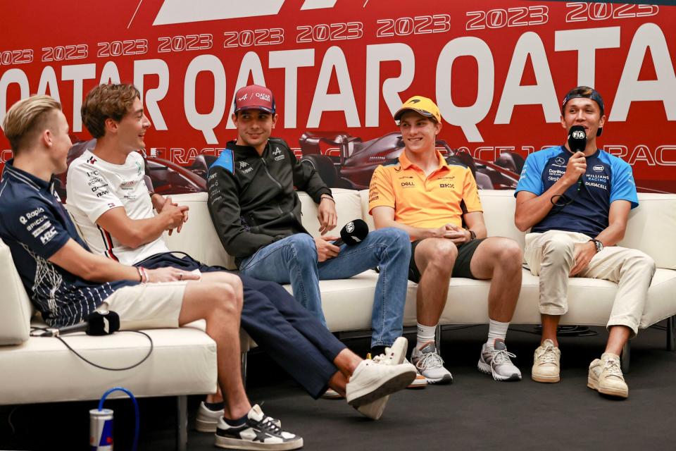 From left to right: F1 drivers Liam Lawson, George Russell, Esteban Ocon, Oscar Piastri, and Alex Albon at the Qatar GP preview. <em>Getty</em>