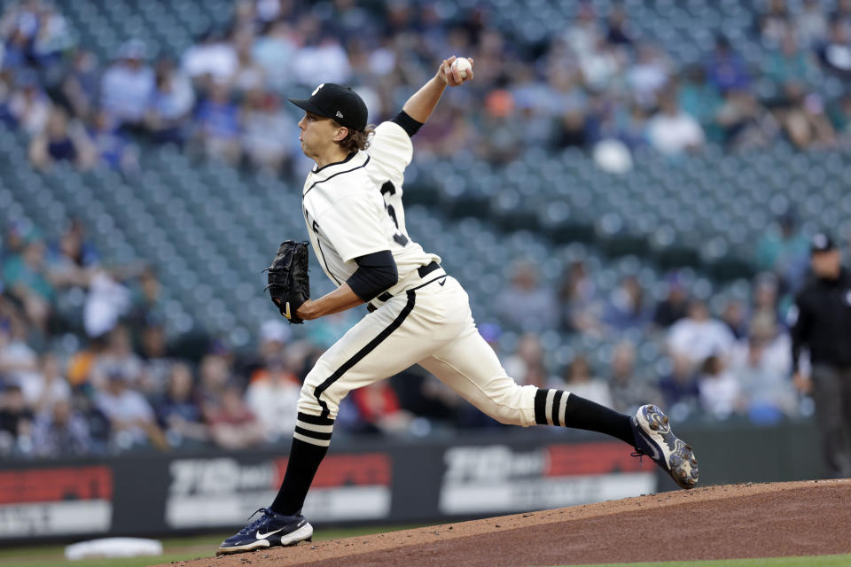 Seattle Mariners starting pitcher Logan Gilbert works against the Tampa Bay Rays during the first inning of a baseball game Saturday, June 19, 2021, in Seattle. (AP Photo/John Froschauer)