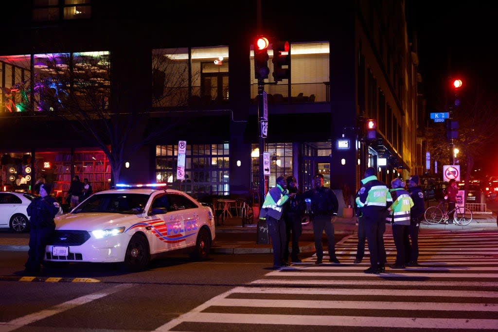 Police standby as demonstrators participate in a protest against the police killing of Tyre Nichols on January 27, 2023 in Washington, DC. (Photo by Tasos Katopodis/Getty Images)