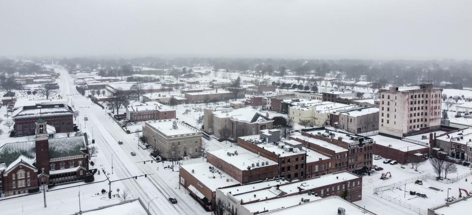 Photographer Mike Gibson took his drone into the sky to show the snowfall over Gastonia early Sunday morning, Jan. 16, 2022.