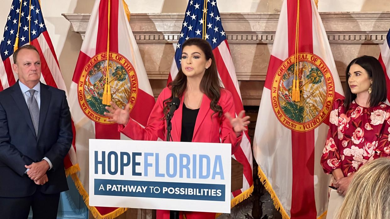 First Lady Casey DeSantis speaks at New College of Florida on Thursday, Oct. 19, 2023. She and New College President Richard Corcoran (left) spoke about a new partnership between the school and the state's Hope Florida program.