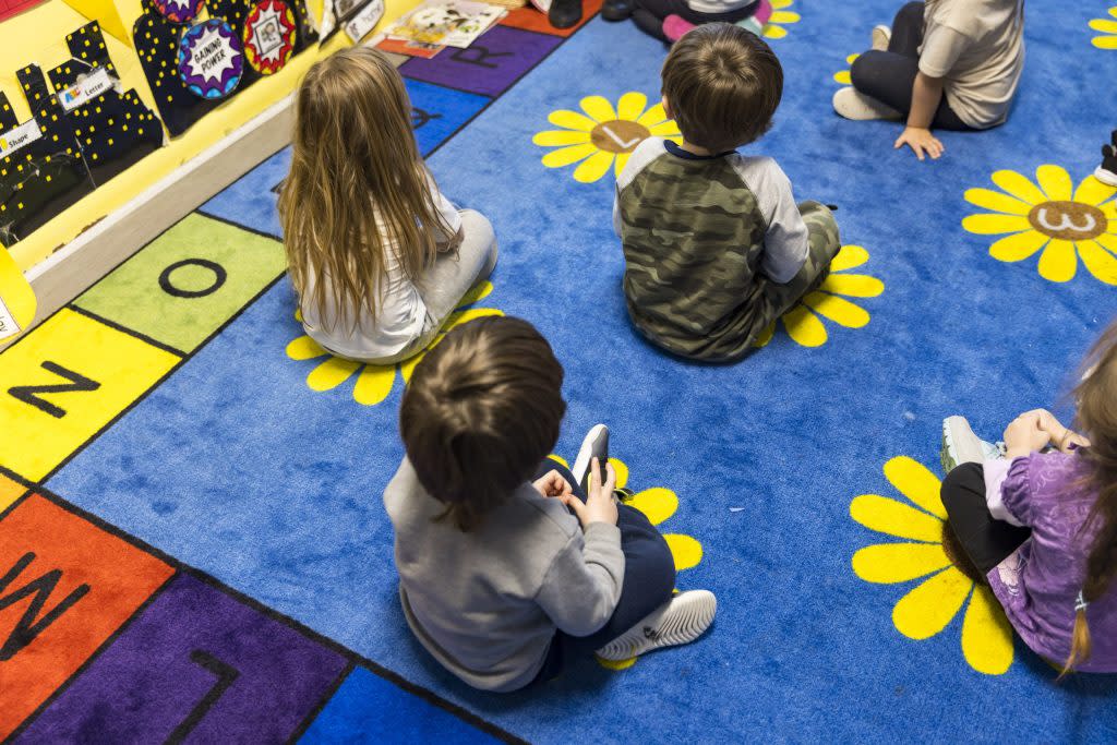 Children at an education and childcare center in Des Moines, Iowa, U.S., on Feb. 9, 2022. Since Covid-19 arrived in earnest in early 2020, about one-third of childcare centers have closed and some 111,000 workers have departed the sector. Photographer:Kathryn Gamble/Bloomberg via Getty Images