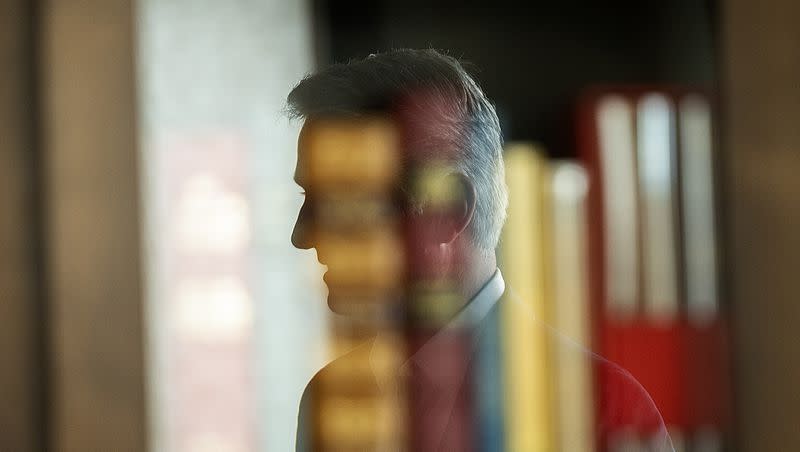 Former national security adviser to President Donald Trump and potential candidate for U.S. Senate Robert C. O’Brien is reflected in the glass of a bookcase as he talks after doing an interview at his home in the Greater Salt Lake area on Tuesday, July 18, 2023.