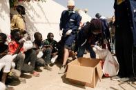 Food distribution to street children amid the coronavirus disease (COVID-19) outbreak in Dakar