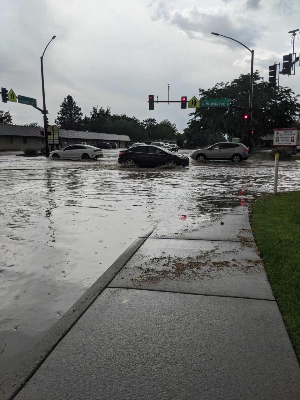 Areas in west Boise, such as along Milwaukee Street, suffered localized flooding on Tuesday afternoon after a heavy storm hit the area.