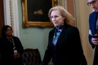 Sen. Gillibrand walks past the Senate chamber during a break in the Senate impeachment trial of President Trump