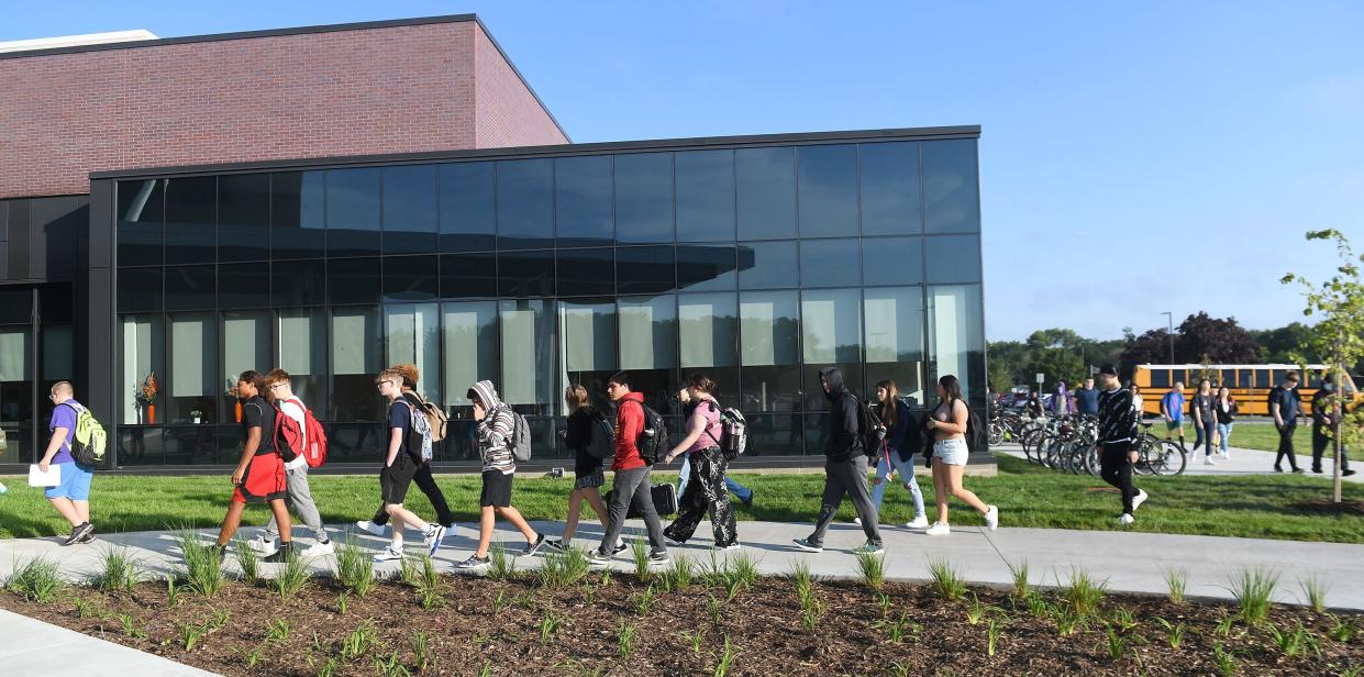 Ames High School's students walk to their classes in the new school building during the first day of school Thursday, Aug. 25, 2022, in Ames, Iowa.