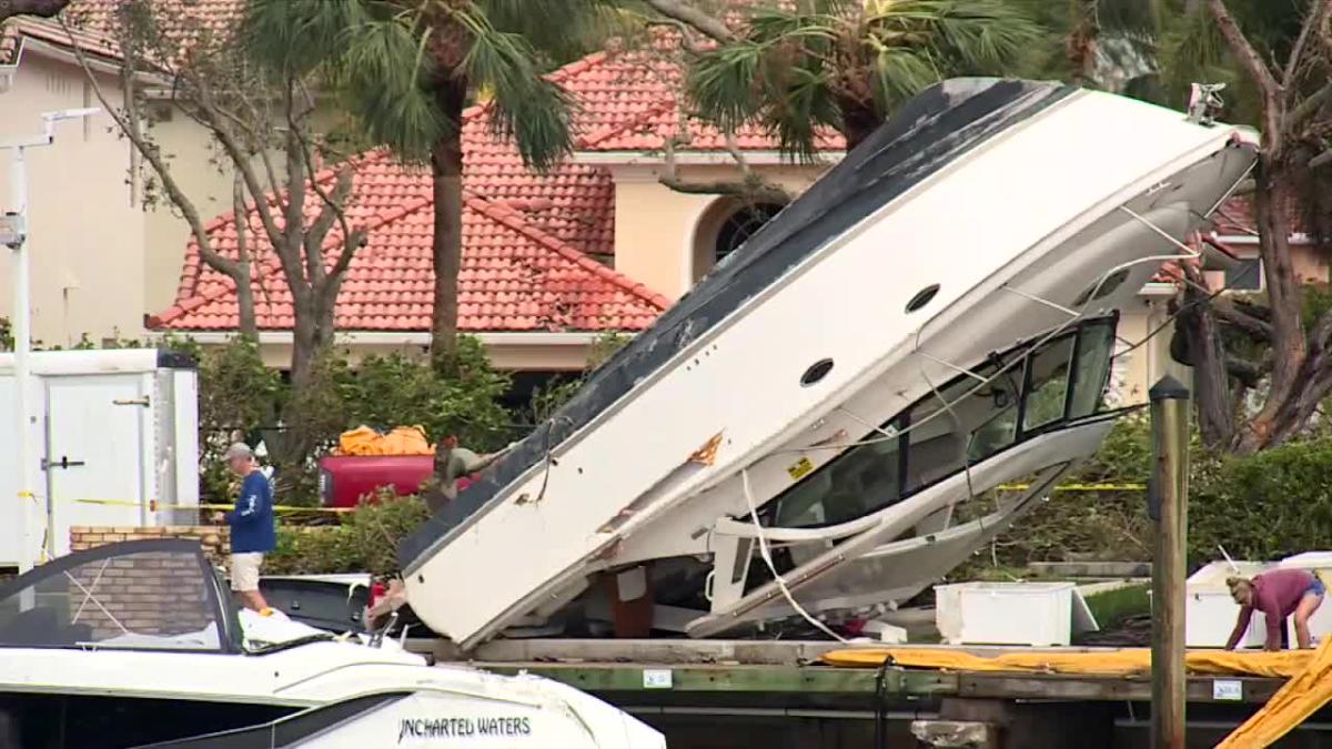 Tornado tosses boat from cove onto lawn in North Palm Beach