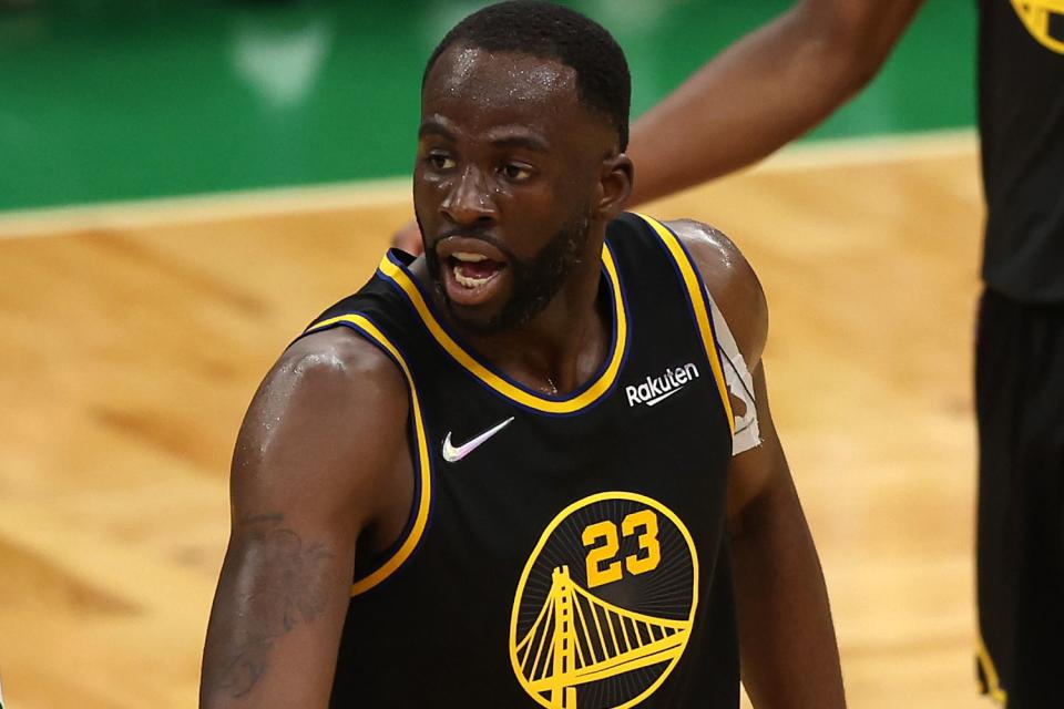 Draymond Green #23 of the Golden State Warriors reacts to a play in the third quarter against Derrick White #9