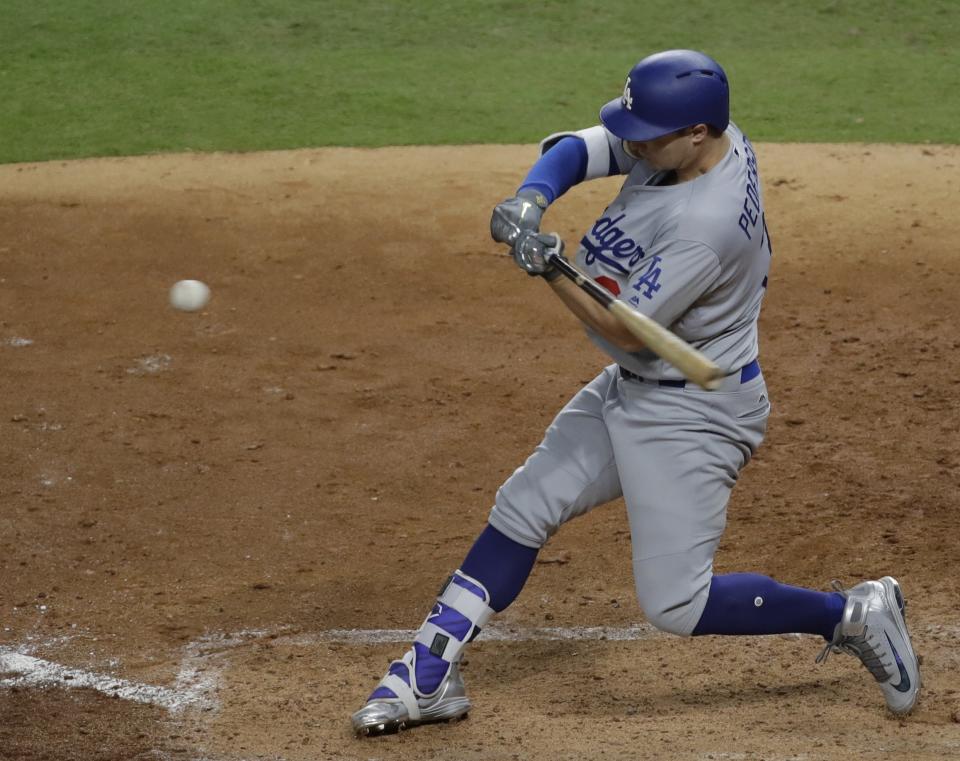 Joc Pederson’s home run in Game 4 broke the contest open. (AP Photo/Eric Gay)