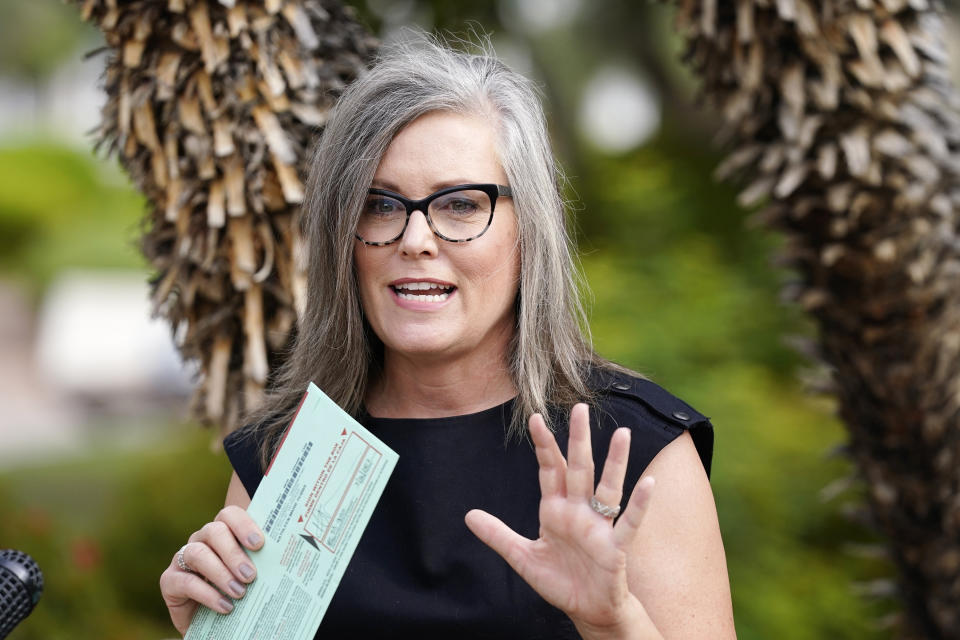 FILE - Arizona Democratic gubernatorial candidate Katie Hobbs speaks to the media before dropping off her primary election ballot, July 21, 2022, in Scottsdale, Ariz. Hobbs has declined a televised debate with Republican Kari Lake. (AP Photo/Ross D. Franklin, File)