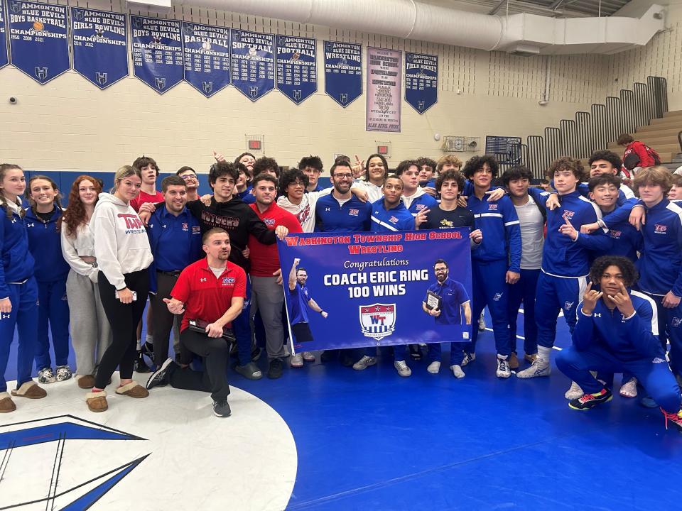The Washington Township High School wrestling team captured the team title at the Hammonton Blue Devil Duals on Saturday, earning head coach Eric Ring his 100th career win in the process.