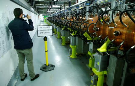 People visit the new linear accelerator Linac 4, the newest accelerator acquisition since the Large Hadron Collider (LHC), which is due to feed the CERN accelerator complex with particle beams of higher energy, during its inauguration at the European Organization for Nuclear Research (CERN) in Meyrin near Geneva, Switzerland, May 9, 2017. REUTERS/Denis Balibouse