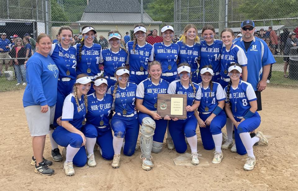 The Horseheads softball team with its championship plaque after rallying for a 7-5 win over Corning in the Section 4 Class AA final May 28, 2022 at the BAGSAI Complex in Binghamton.