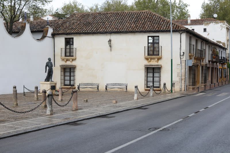 An empty street is pictured during partial lockdown in downtown Ronda