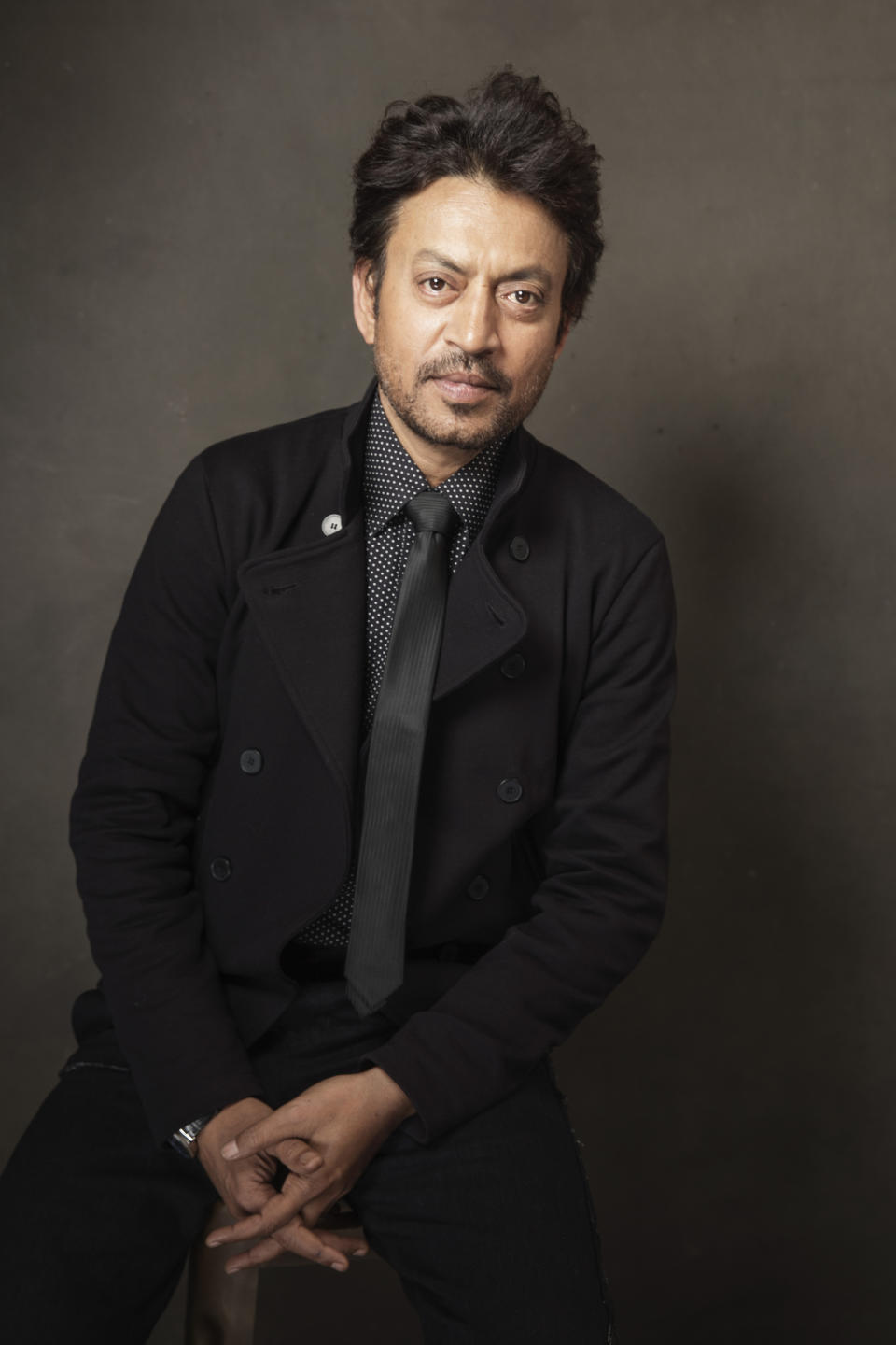 Irrfan Khan poses for a portrait at Quaker Good Energy Lodge with GenArt and the Collective, during the Sundance Film Festival, on Monday, Jan. 20, 2014 in Park City, Utah. (Photo by Victoria Will/Invision/AP)