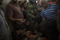 <p>The funeral of Omar Abu El Fool (30), a Hamas member killed by Israeli troops during the “Great March of Return” protests on May 14, 2018. (Photo: Fabio Bucciarelli for Yahoo News) </p>