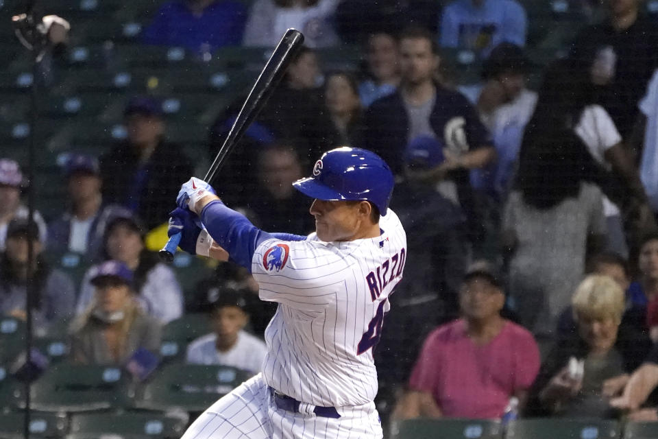 Chicago Cubs' Anthony Rizzo follows through on an RBI triple off Philadelphia Phillies starting pitcher Zack Wheeler during the second inning of a baseball game Wednesday, July 7, 2021, in Chicago. Joc Pederson scored. (AP Photo/Charles Rex Arbogast)