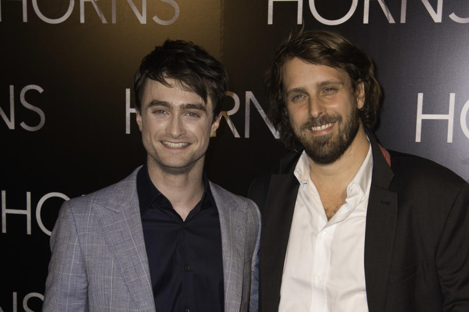 Daniel Radcliffe and director Alexandre Aja attend the 'Horns' premiere on September 16, 2014. (Photo by Stephane Cardinale/Corbis via Getty Images)