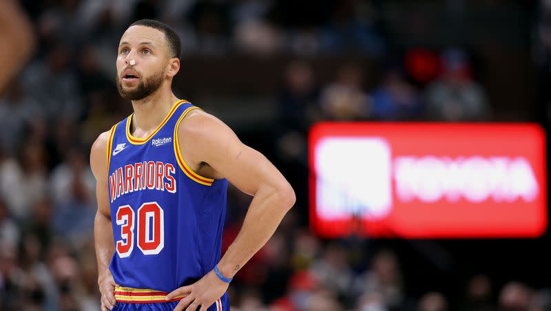 Golden State Warriors guard Stephen Curry (30) looks on during a free-throw as the Utah Jazz and the Golden State Warriors play an NBA basketball game at Vivint Arena in Salt Lake City Utah on Wednesday, Feb. 9, 2022. Utah won 111-85.