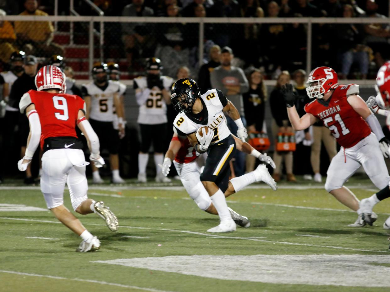 Jayden Wallace strives for extra yards during Tri-Valley's 28-17 win against host Sheridan on Friday night at Paul Culver Jr. Stadium.