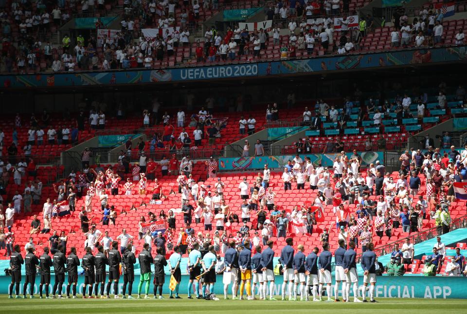 England and Croatia line up at Wembley ahead of their opening Euro 2020 match on 13 June, 2021.  (PA)
