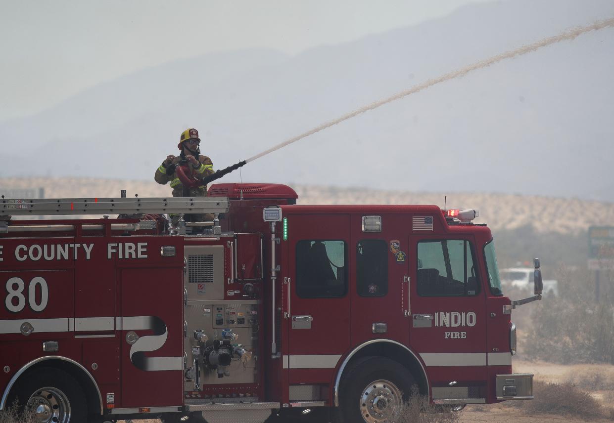 Firefighers battle a fire that destroyed mobile homes at the Country Squire RV and Mobile Home Park in Desert Hot Springs, Calif., July 18, 2023. 