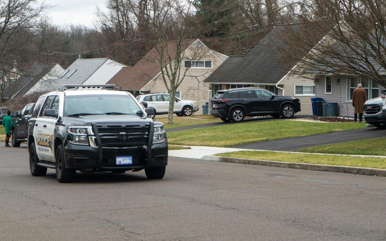 A Middletown Township police officer drives through the Upper Orchard neighborhood where a beheading took place Tuesday in Middletown Township. Jan.31, 2024.